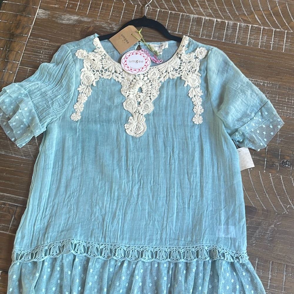 Gauzy short sleeve blouse; color: aqua/teal; size s; damage on left shoulder;NWT